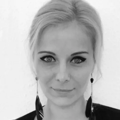 black and white photo of Krisztina Gadnai, finance manager at bookedby.me